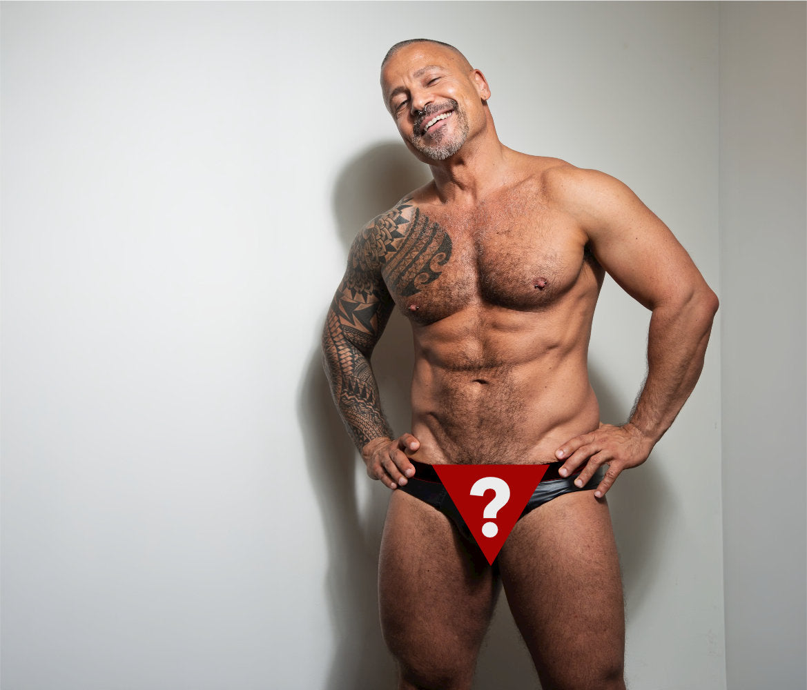 smiling handsome man wearing the upcoming Unapologaytic underwear