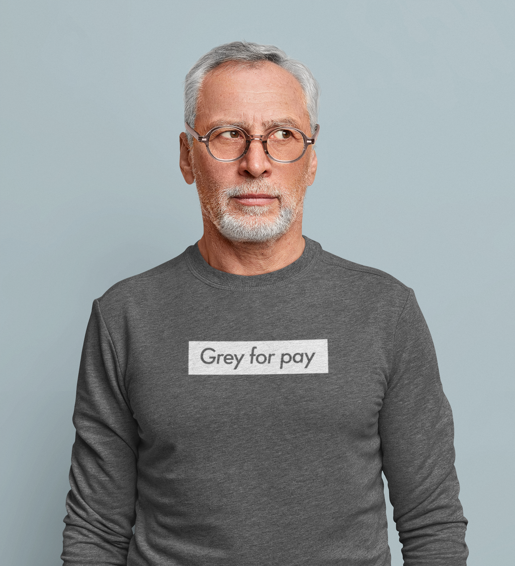 Mature gay man wearing a sweatshirt reading grey for pay slogan